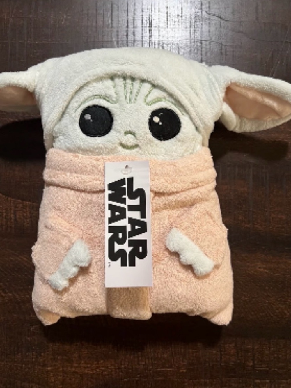 Star Wars stuffed Grogu, also known as "Baby Yoda, that converts to a blanket.